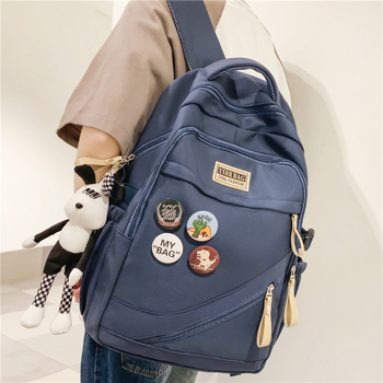 Unisex νάιλον σακίδιο ταξιδιού με ρετρό κολλεγιακό σχέδιο, επένδυση από πολυεστέρα, καμπύλες ρυθμιζόμενες ιμάντες ώμου, λειτουργία μείωσης φόρτου, κυκλοφόρησε το καλοκαίρι του 2023