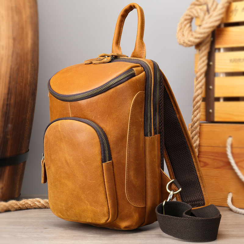 MAV ādas vīriešu krūšu somiņa, cilindriska forma, vienkrāsains raksts, poliesterā iekšpuse, nodilizturīga, paplašināma