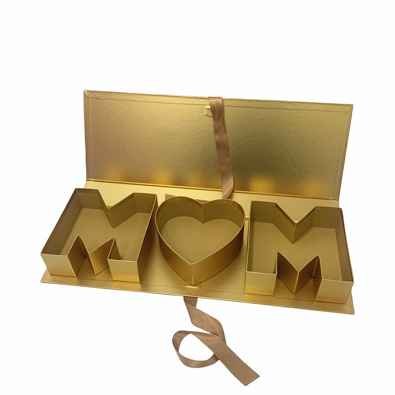 Gėlių dovanos dėžutė su M-M raidžių motyvu Motinos dienai — popierius/kartonas, ofsetinis spausdinimas, įpakavimo dėžutė, logotipo spausdinimas galimas