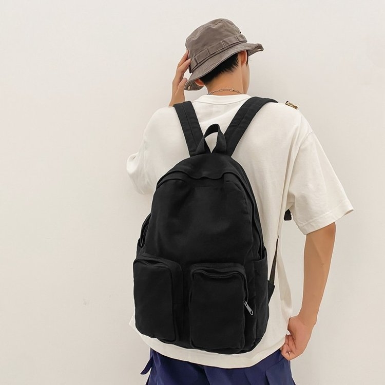 Kanvas ruksak u gradskoj jednostavnosti, s zip zatvaračem, pretincem za prijenosno računalo i unutarnjim slojem