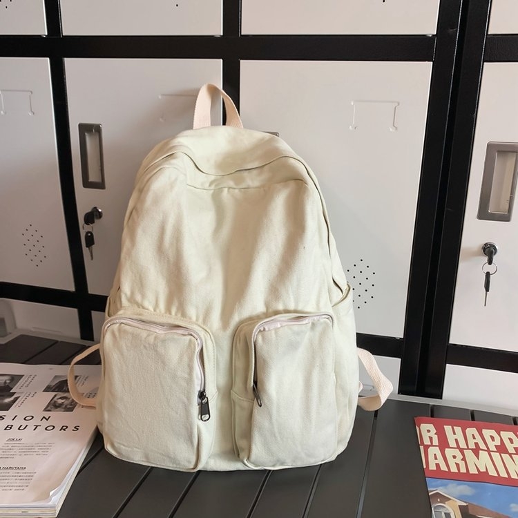 Kanvas ruksak u gradskoj jednostavnosti, s zip zatvaračem, pretincem za prijenosno računalo i unutarnjim slojem