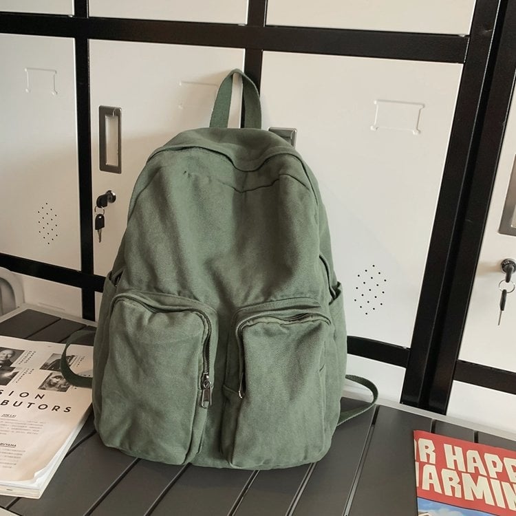 Kanvas ruksak u gradskoj jednostavnosti, s zip zatvaračem, pretincem za prijenosno računalo i unutarnjim slojem