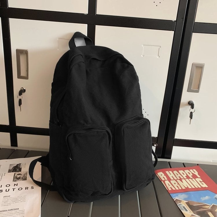 Kanvas ruksak u gradskoj jednostavnosti, s zip zatvaračem, pretincem za prijenosno računalo i unutarnjim slojem