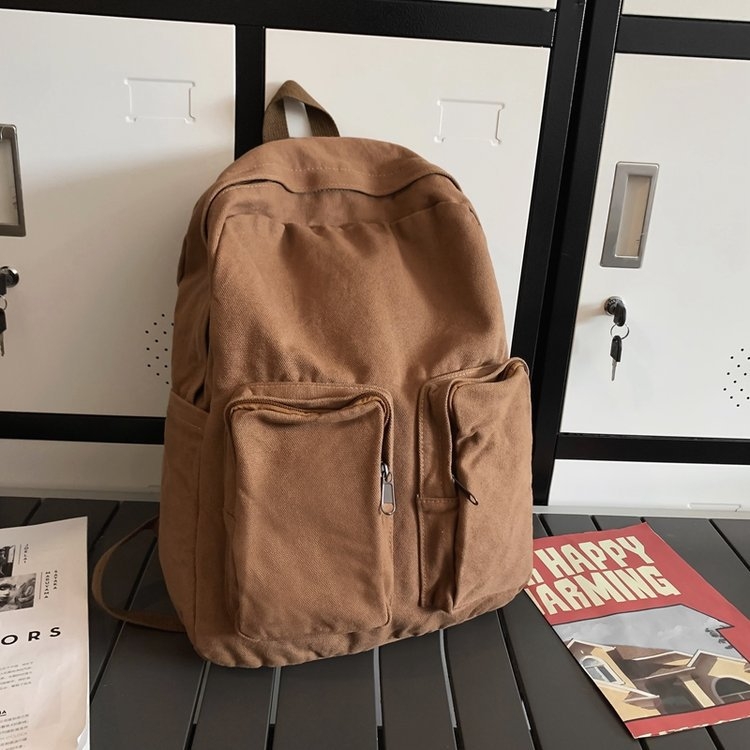 Kanvas ruksak u gradskoj jednostavnosti, s zip zatvaračem, pretincem za prijenosno računalo i unutarnjim slojem