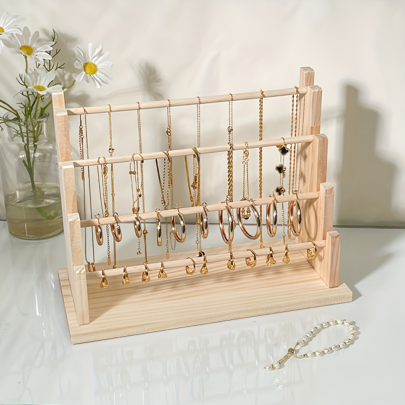 Masīva koka rokassprādžu un juvelierizstrādājumu displeja statīvs — četrstāvu kāpņu rāmis, šuvju darbs, pavasaris 2024