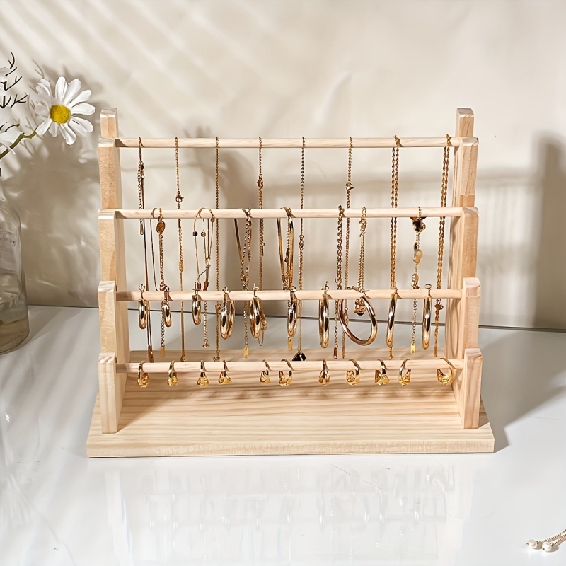 Masīva koka rokassprādžu un juvelierizstrādājumu displeja statīvs — četrstāvu kāpņu rāmis, šuvju darbs, pavasaris 2024