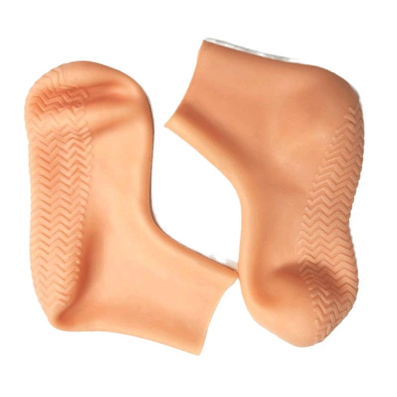 Zeķu pārsegi ar silikona vāciņiem – vissezonas kāju aizsargi no SEBS, modeļi S/33-39 un L/40-46, svars 175 g / 225 g, iepakoti caurspīdīgā maisiņā