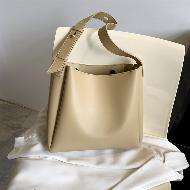 Moteriška kibiro formos rankinė | PU materijala, magnetinis užsegimas, poliesterio pamušalas, vidiniai kišenės: užtrauktuko kišenė ir telefono kišenė