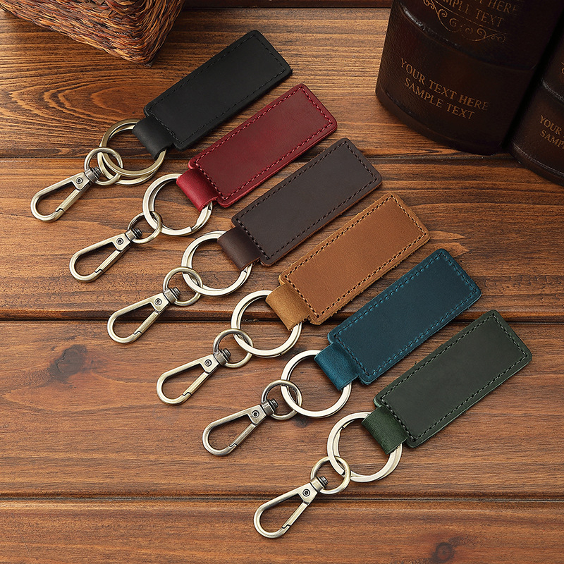 Lisa atslēgu piekariņš no īstas ādas, pirmais slānis govju ādas, vienkrāsains, 1 locījuma maks, pilsētas minimalistiskais stils