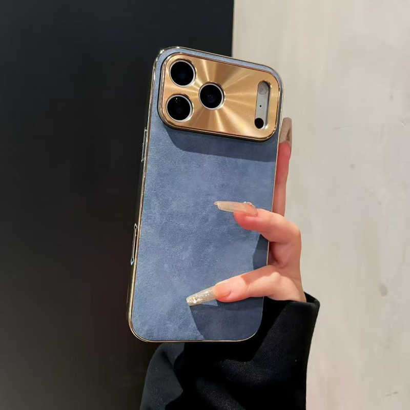 IPhone maciņš no aitu ādas ar elektroplatētu metāla lēcu; triecienizturīgs, pret pirkstu nospiedumiem; saderīgs ar iPhone 11–14 sēriju