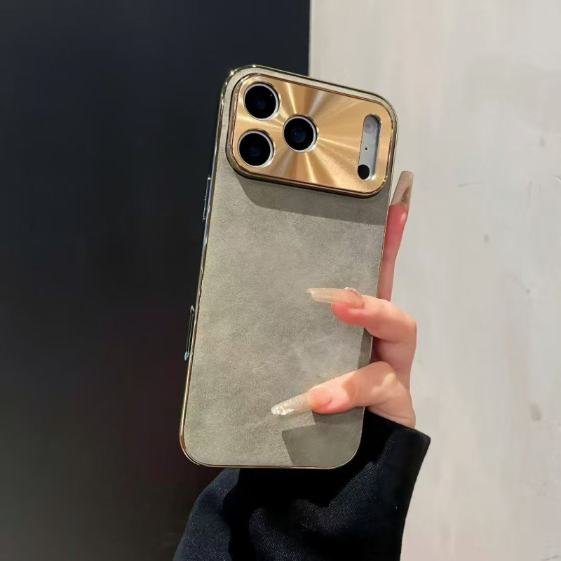 IPhone maciņš no aitu ādas ar elektroplatētu metāla lēcu; triecienizturīgs, pret pirkstu nospiedumiem; saderīgs ar iPhone 11–14 sēriju