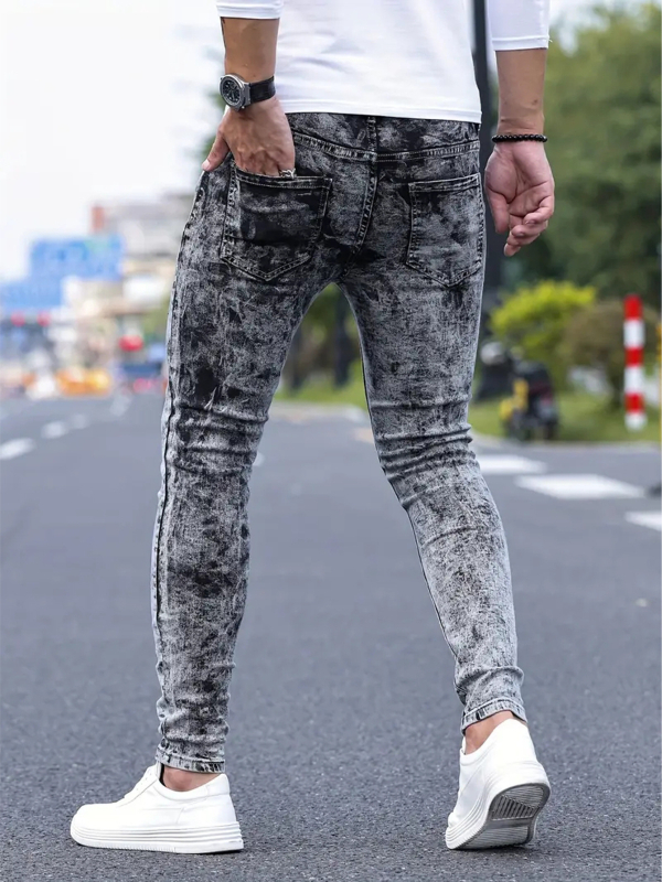 Blugi cu detalii uzate, denim cu microelasticitate, croială slim drept, talie medie, 80% bumbac