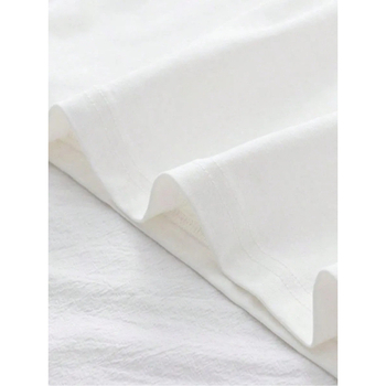 Βαμβακερή κοντομάνικη μπλούζα με στρογγυλή λαιμόκοψη και 3D μοτίβο, μεσαίο μήκος.