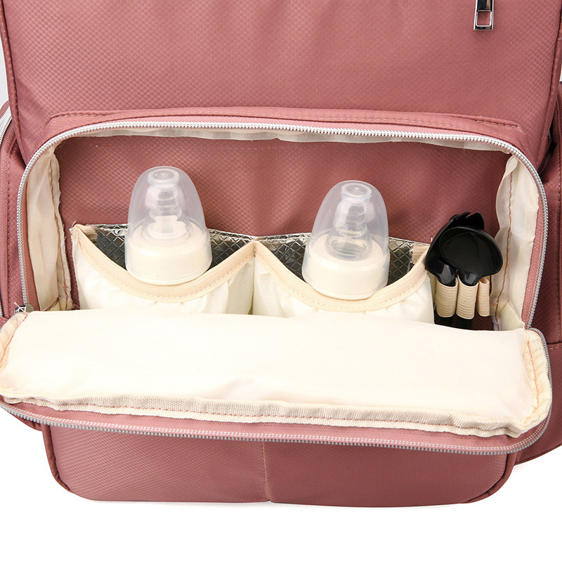 Σετ δύο τσαντών μαμά-μπέμπι με στρώμα για πάνες, εξωτερικό ύφασμα Oxford, επένδυση πολυεστέρα, ιμάντες με αερόσφυξεις, μόνωση και προστασία της σπονδυλικής στήλης