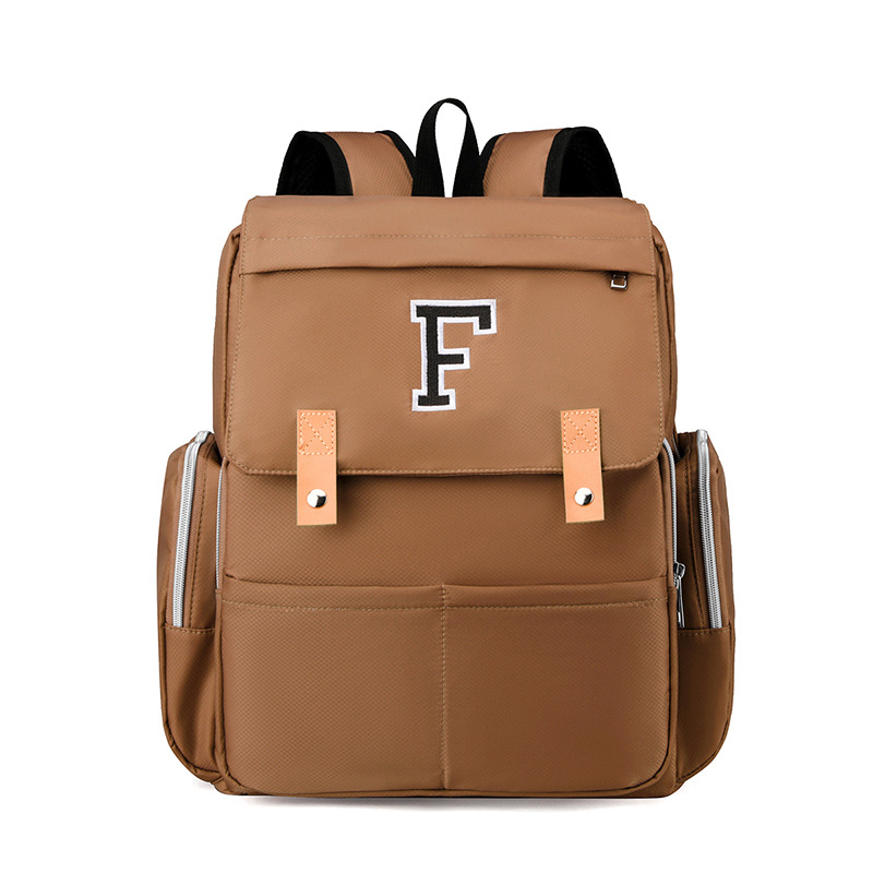 Σετ δύο τσαντών μαμά-μπέμπι με στρώμα για πάνες, εξωτερικό ύφασμα Oxford, επένδυση πολυεστέρα, ιμάντες με αερόσφυξεις, μόνωση και προστασία της σπονδυλικής στήλης