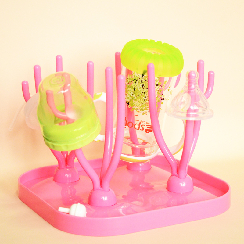 Daudzfunkcionāls statīvs pudelēm un knupēm žāvēšanai, PP materiāls, cartoon stila sirsnīgs izskats