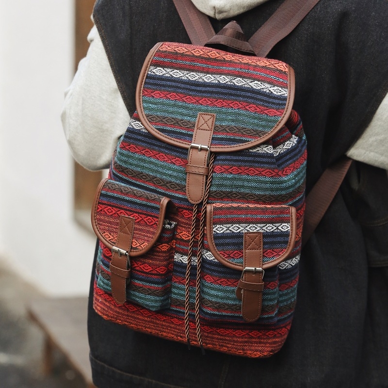 kanvas mugursoma etniskā-nacionālā stilā ar šņorēšanas aizvēršanu, iekšējā kabata ar rāvējslēdzēju, poliestera oderējums