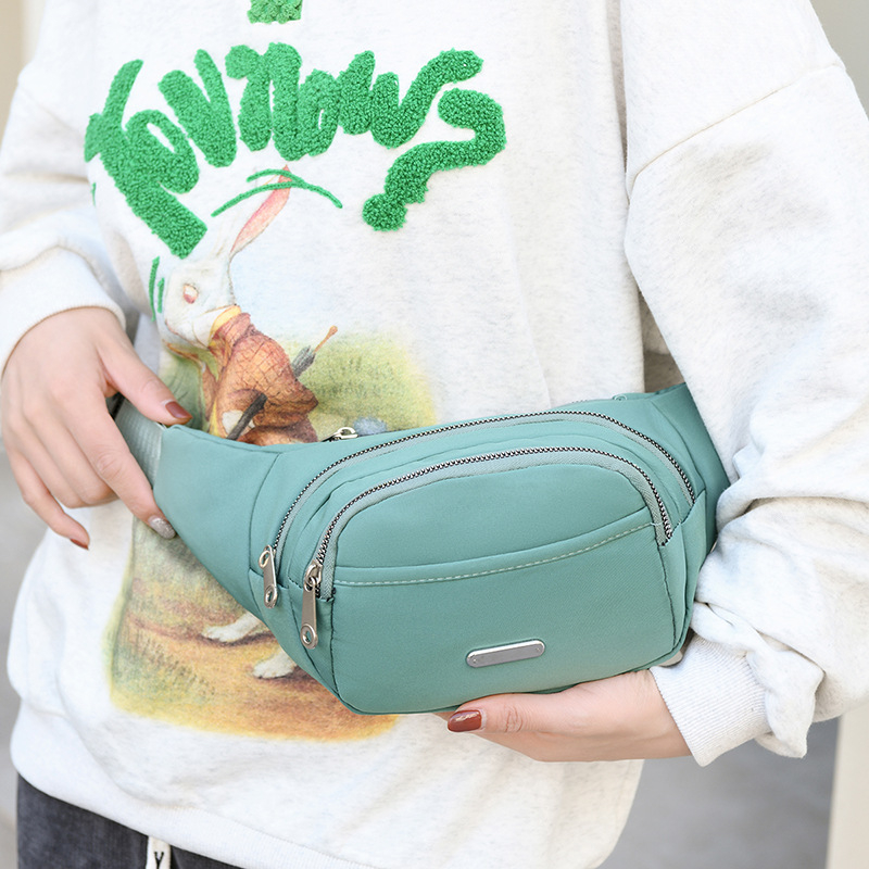 Vidukļa soma, Daudzfunkcionāla ikdienas lietošanai, neilons ārējā daļa, poliestera odere, rāvējslēdzējs, slēpta rāvējslēdzēja kabata, mīksta