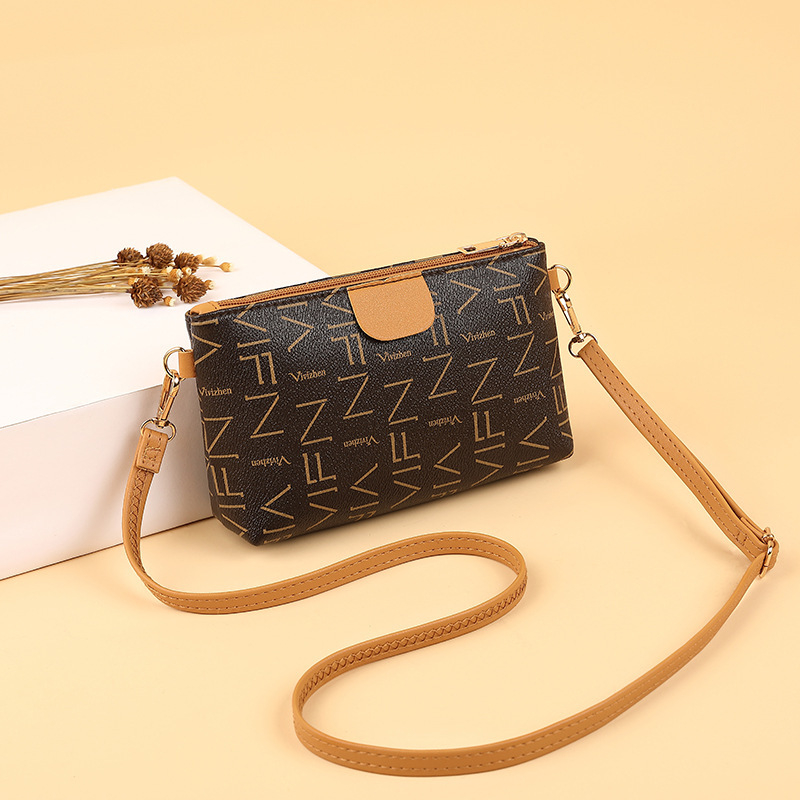 Női crossbody táska betűs nyomtatással, PU anyag, texturált vállpánt, vízszintes négyzet alakú forma, cipzáras nyitás, mindennapi használatra