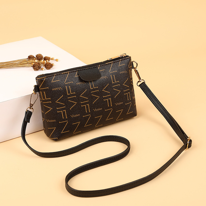 Női crossbody táska betűs nyomtatással, PU anyag, texturált vállpánt, vízszintes négyzet alakú forma, cipzáras nyitás, mindennapi használatra