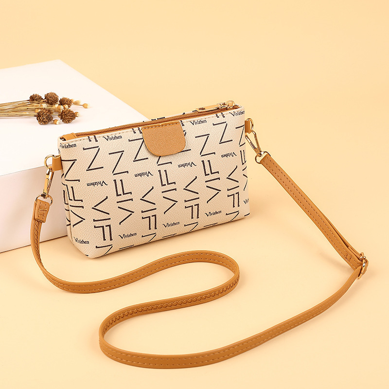 Női crossbody táska betűs nyomtatással, PU anyag, texturált vállpánt, vízszintes négyzet alakú forma, cipzáras nyitás, mindennapi használatra