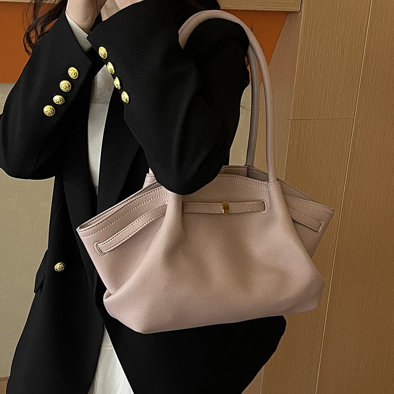 PU ženska torba kružnog oblika, zatvaranje na zip, unutarnji džep za mobitel, dvije naramenice