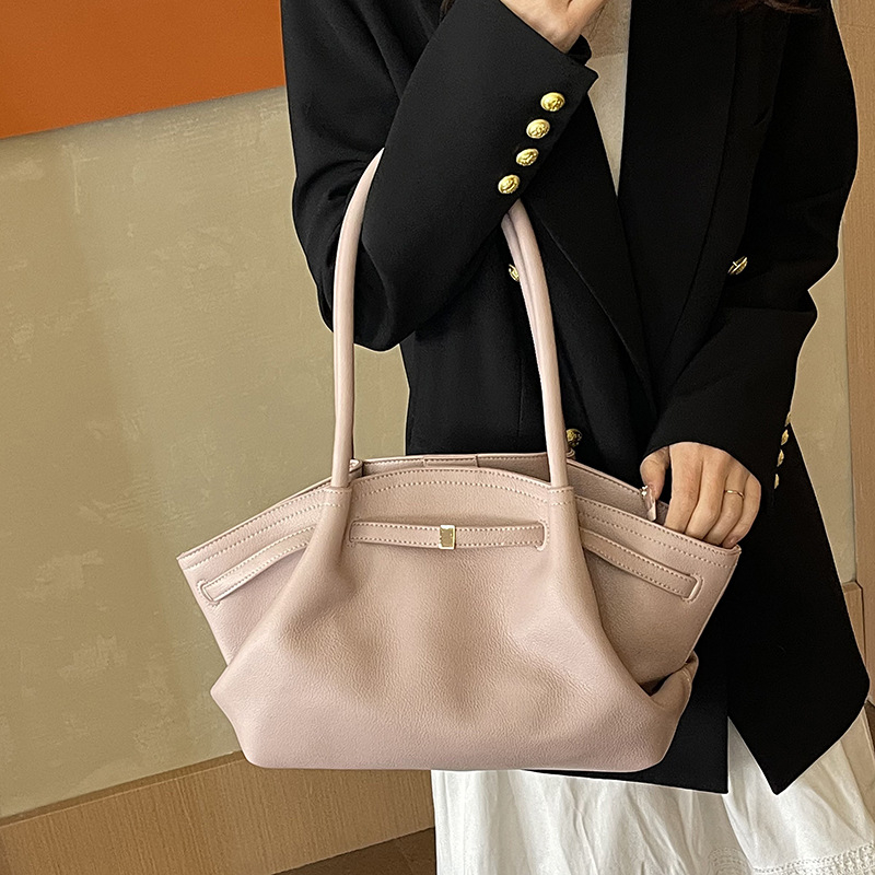 PU ženska torba kružnog oblika, zatvaranje na zip, unutarnji džep za mobitel, dvije naramenice