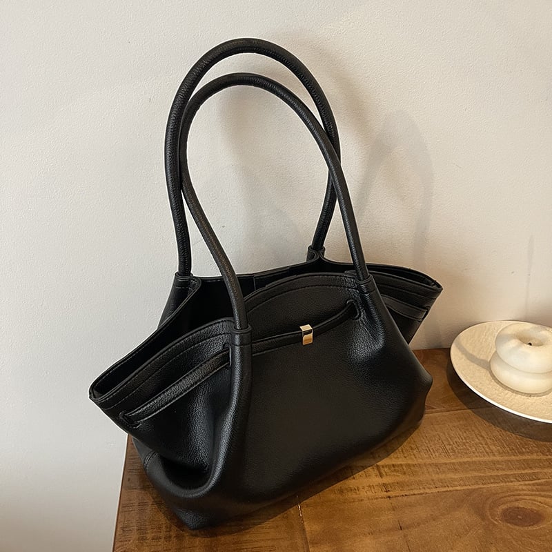 PU ženska torba kružnog oblika, zatvaranje na zip, unutarnji džep za mobitel, dvije naramenice