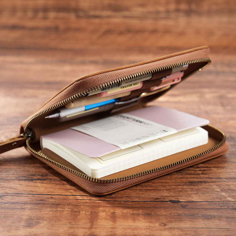 A6 ādas piezīmju vāciņš ar rāvējslēdzēju un fiksētām lapām – augšējās kvalitātes liellopu āda, brīvi lapu saistīšana, Dowling papīrs 100 g, 100–200 lapas, zīmols AIPIYI