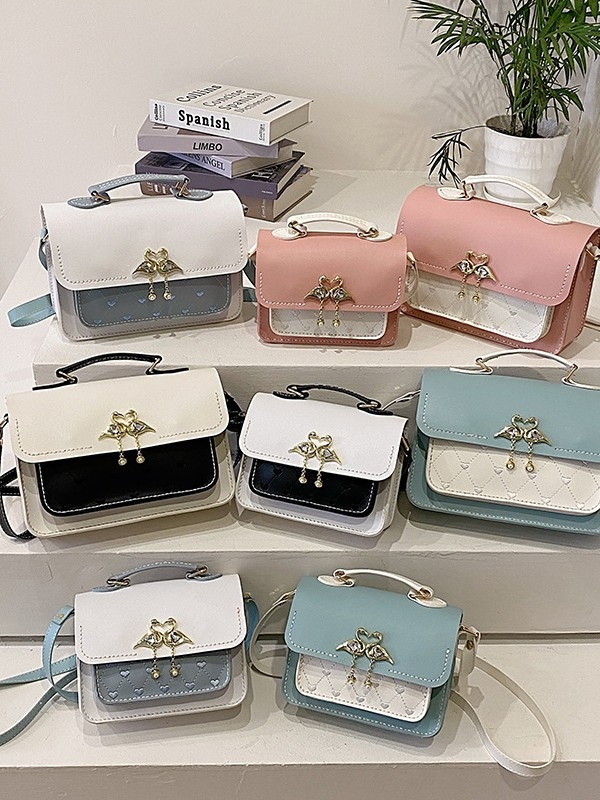 Ženska torbica na rame u uličnoj modi, PU materijal, uspravni kvadratni oblik, zatvaranje poklopcem, unutarnja ID pretinac