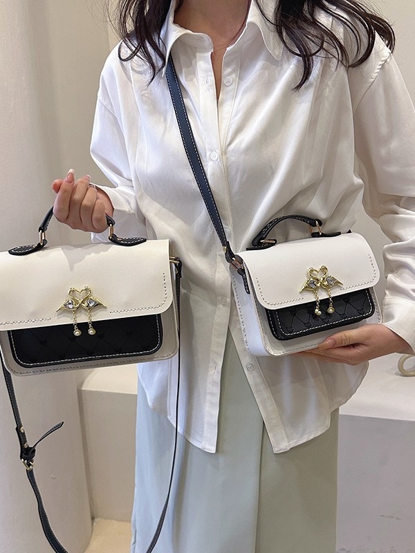 Ženska torbica na rame u uličnoj modi, PU materijal, uspravni kvadratni oblik, zatvaranje poklopcem, unutarnja ID pretinac