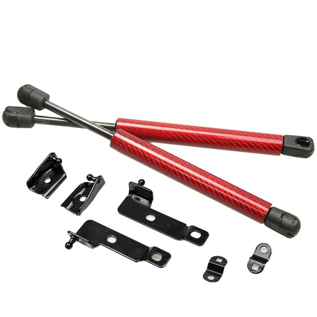 Αμορτισέρ καπό για Nissan Navara D40 – ελεύθερου τύπου συμπίεσης, διαδρομή 125 mm, απόσταση εγκατάστασης 357 mm, γεμάτο με άζωτο