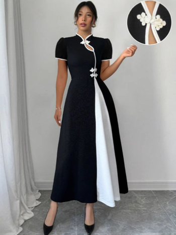 Haljina s blokovima boja, puff rukavi, stojeći ovratnik, prednja s tri gumba, duga A-linija silueta