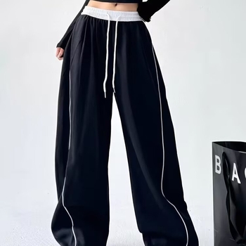 Γυναικείες παντελόνες casual-αθλητικές με ελαστική μέση και ίσια γραμμή; Ύφασμα: αντίγραφο μαλλιού; Κύριες ίνες: ανακυκλωμένες κυτταρίνες + πολυεστέρας; Στυλ: street fashionista; Σεζόν: Άνοιξη 2025