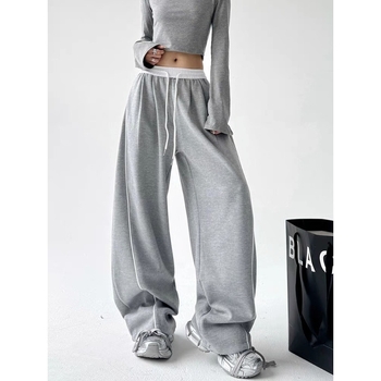 Γυναικείες παντελόνες casual-αθλητικές με ελαστική μέση και ίσια γραμμή; Ύφασμα: αντίγραφο μαλλιού; Κύριες ίνες: ανακυκλωμένες κυτταρίνες + πολυεστέρας; Στυλ: street fashionista; Σεζόν: Άνοιξη 2025