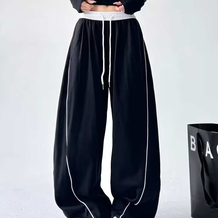 Γυναικείες παντελόνες casual-αθλητικές με ελαστική μέση και ίσια γραμμή; Ύφασμα: αντίγραφο μαλλιού; Κύριες ίνες: ανακυκλωμένες κυτταρίνες + πολυεστέρας; Στυλ: street fashionista; Σεζόν: Άνοιξη 2025