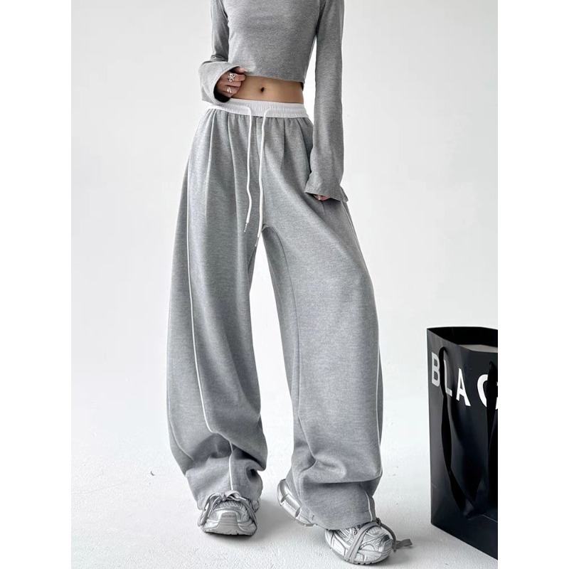 Γυναικείες παντελόνες casual-αθλητικές με ελαστική μέση και ίσια γραμμή; Ύφασμα: αντίγραφο μαλλιού; Κύριες ίνες: ανακυκλωμένες κυτταρίνες + πολυεστέρας; Στυλ: street fashionista; Σεζόν: Άνοιξη 2025