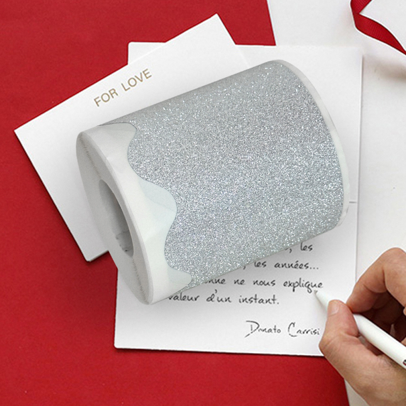 Dekoratyvinės lipnios etiketės ant padengto popieriaus su smėlio tekstūra ir blizgančiomis dalelėmis, nereguliaraus kontūro forma, storis 0,08 mm, ilgalaikė temperatūros atsparumas 60–80°C