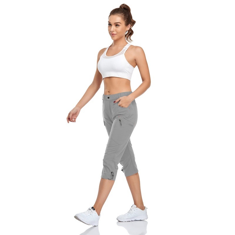 Γυναικείες υδατοαπωθητικές κάπρι πεζοπορίας UPF με ασφαλές τσεπάκι