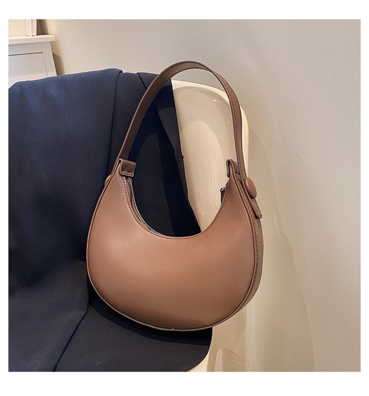 Prancūziško stiliaus mažoji pečių rankinė – PU medžiaga, poliesterio pamušalas, horizontalaus kvadrato siluetas, užtrauktukas, dvigubi pečių diržai