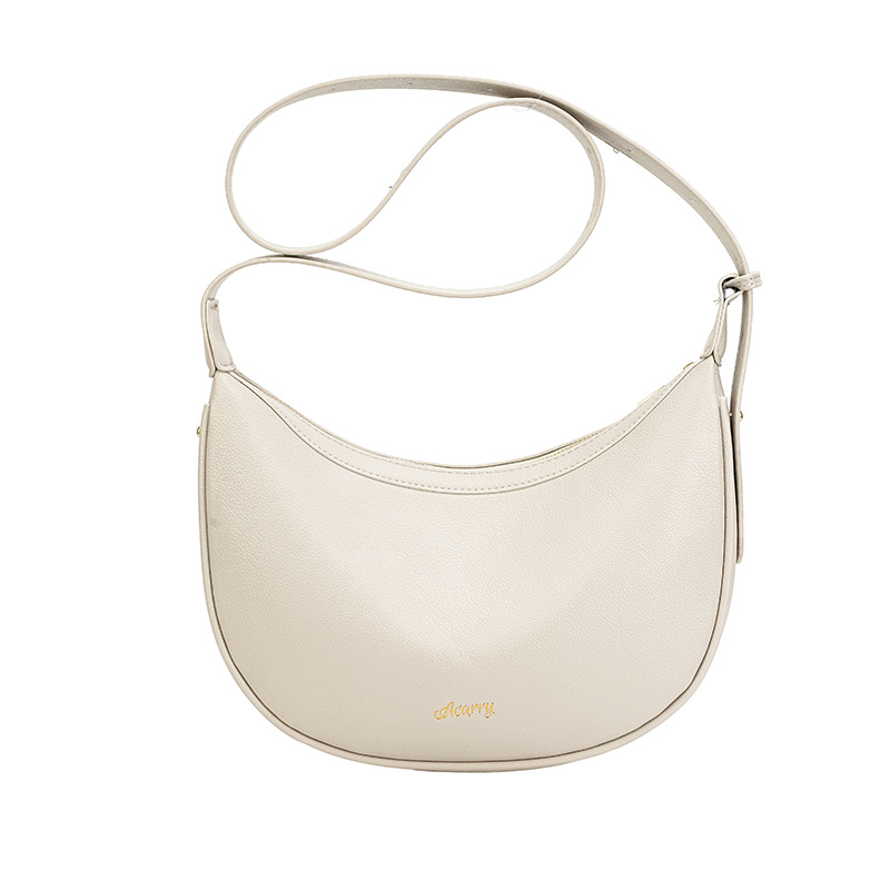 Női crossbody táska puha PU bőrből, dumpling-formájú, cipzáras záródás, belső cipzáras zseb