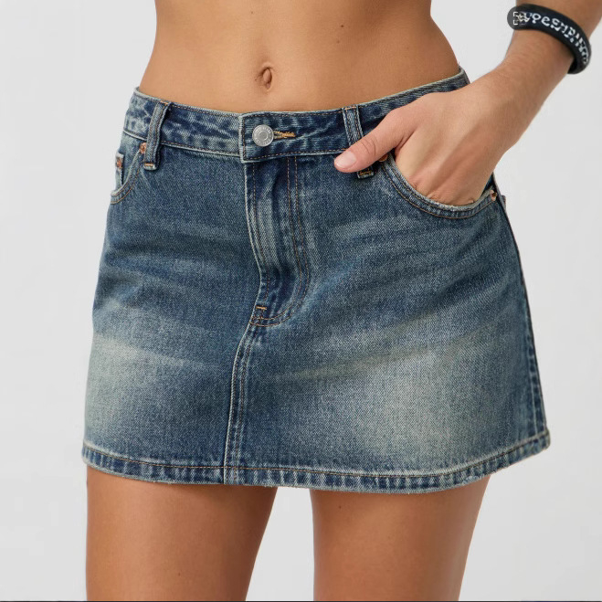 Ženska traper suknja — uski kroj, srednji pojas, ravna silueta, isprani elastični denim