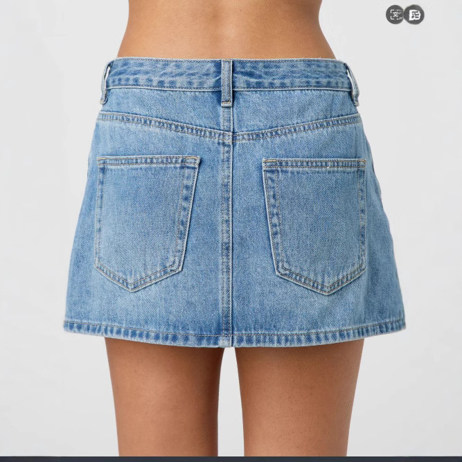 Ženska traper suknja — uski kroj, srednji pojas, ravna silueta, isprani elastični denim