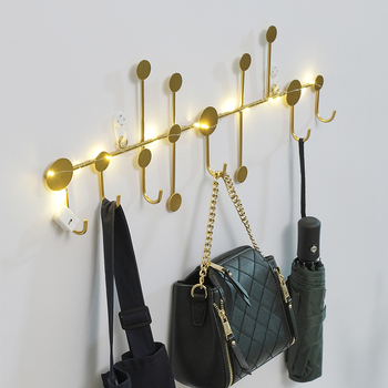 Geležinė drabužių kabykla su lapų motyvu ant įėjimo durų, be gręžimo montavimo, apkrova 5–10 kg, šviesus prabangos stilius