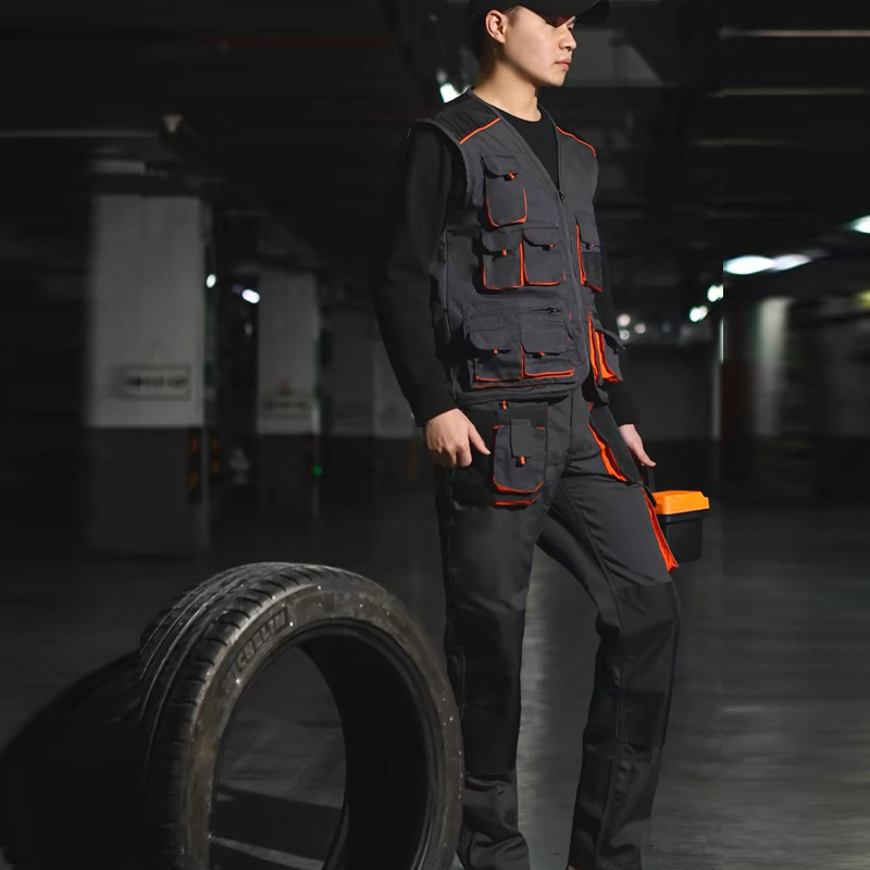 Automobilių remonto darbo drabužių komplektas, patvarus Oxford audinys, dviejų dalių komplektas su daugybe kišenių, dulkių apsauga, galimybė siuvinėti.