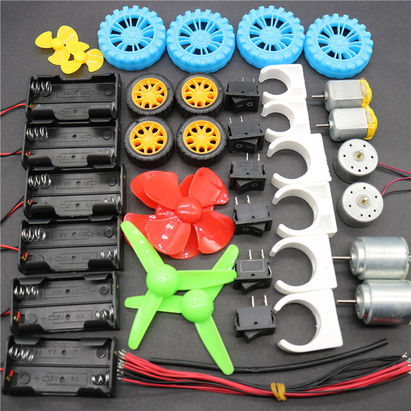 B medžiagų rinkinys, apie 140 komponentų: pavarų variklis, baterijų dėžutė, ratų modelio rinkinys