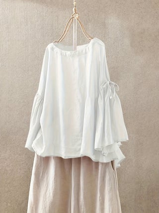 Moteriškas laisvo kirpimo topas su apvaliu kaklu, trumpomis rankovėmis, poliesterio mišinio 30–50%