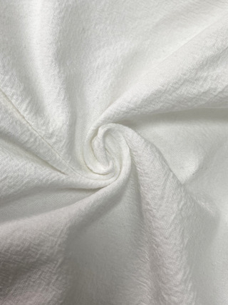 Moteriškas laisvo kirpimo topas su apvaliu kaklu, trumpomis rankovėmis, poliesterio mišinio 30–50%