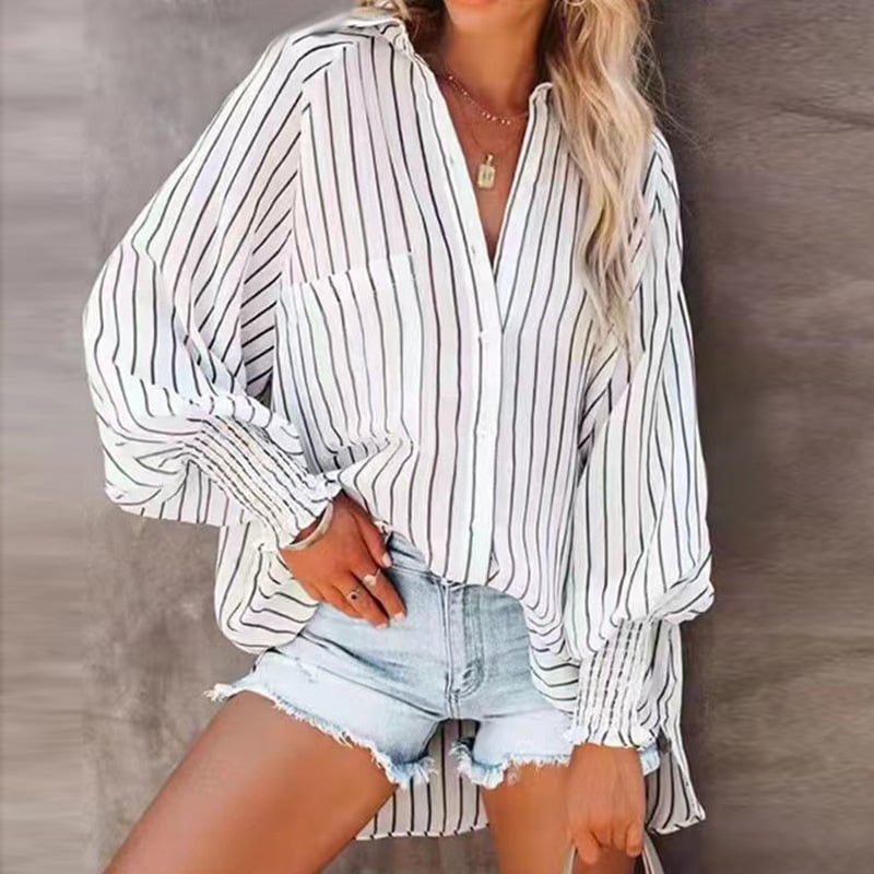 Svītrainā poliestera kreklu stilā, brīvā piegriezuma, garas piedurknes, reversa apkakle, vienas rindas pogas, garums 50–65 cm