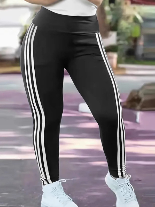 Legginai su šonine juostele jogai – medžiaga: poliesteris su elastanu; 90–95% poliesterio; siauras kirpimas; vidutinio storio; pavasaris 2025